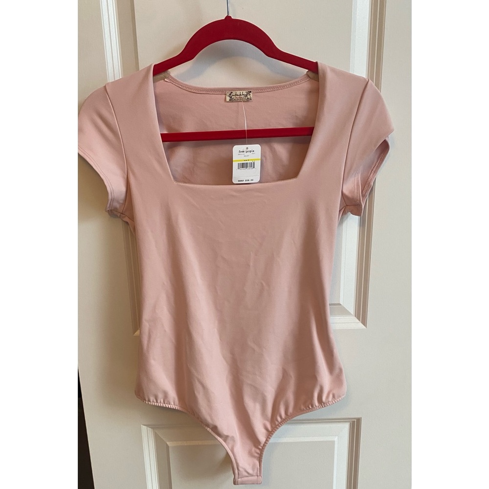 Pink short sleeve Free People bodysuit - NWT - M